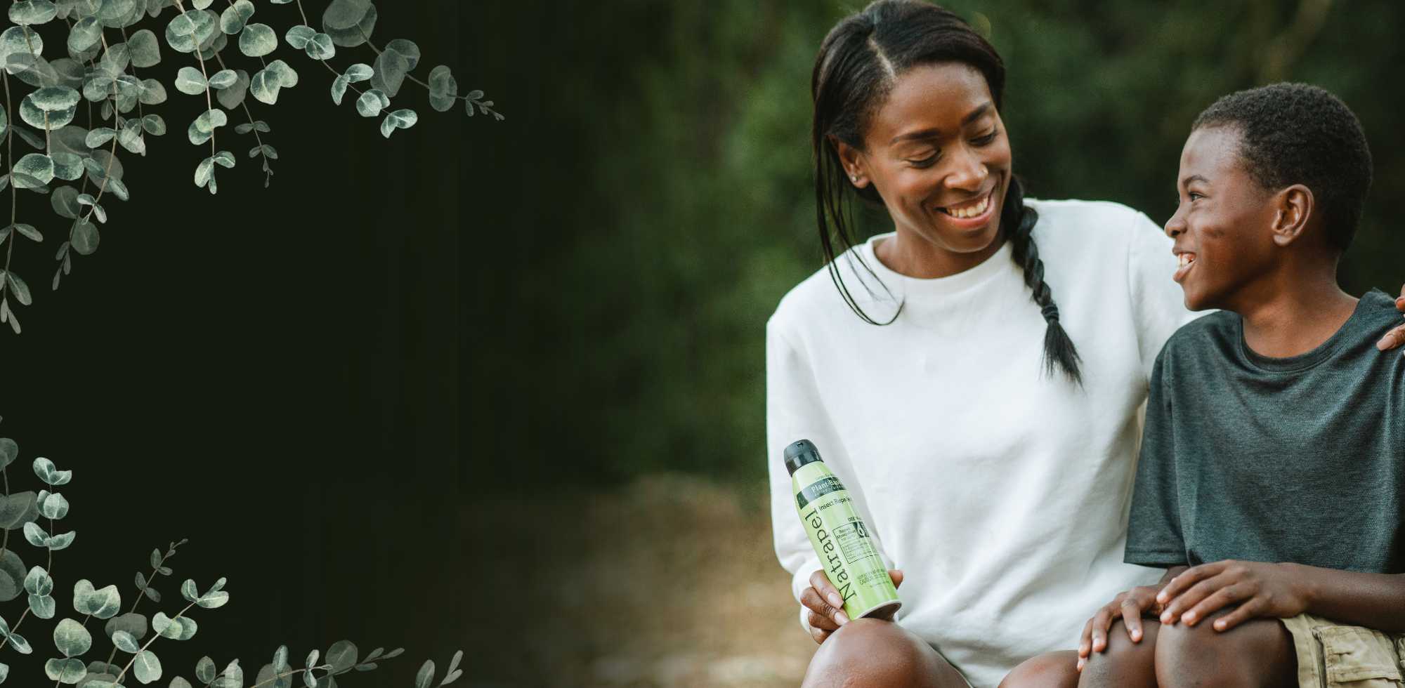 Mother and son with Natrapel Picaridin 6 oz Insect Repellent near eucalyptus leaves
