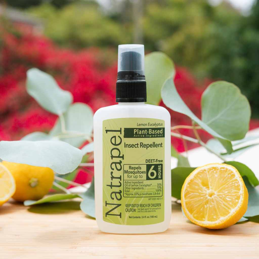 Natrapel Lemon Eucalyptus Tick & Insect Repellent 3.4 oz. Pump Spray in front of lemon and eucalyptus on a table